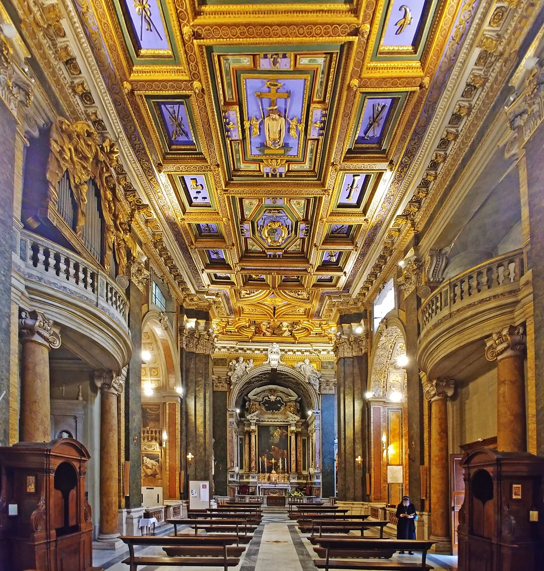 The narrow gilded nave of San Girolamo della Carità in Rome, looking toward the high altar.