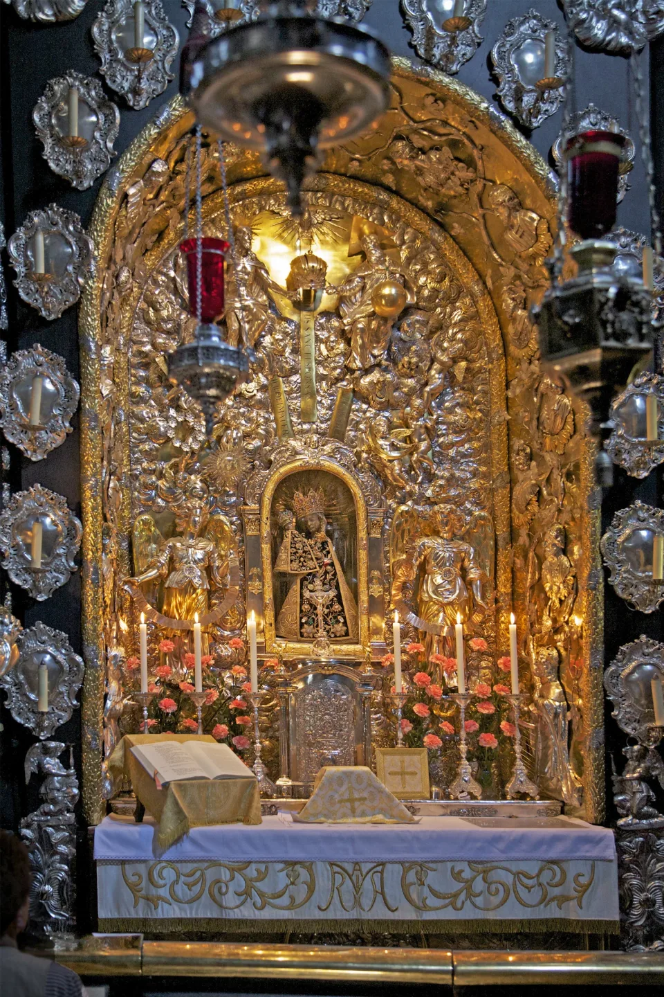 The clothed image of Our Lady of Altötting at the chapel altar.