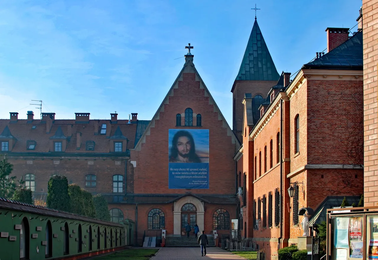 The gable of the convent chapel of St. Joseph at Kraków-Łagiewniki, hung with a large banner of the Merciful Jesus.