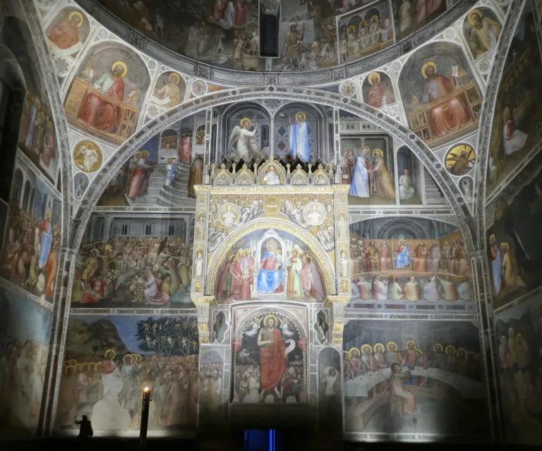Giusto de' Menabuoi's densely painted fresco cycle covering the walls and dome of the Padua Baptistery.