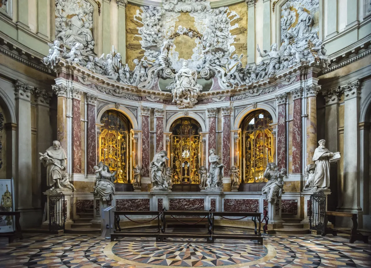 The Chapel of the Relics in the Basilica of Saint Anthony in Padua, its tiered marble and gilt reliquary wall behind the high altar.
