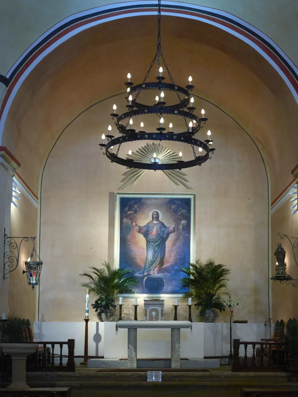 The simple sanctuary and altar inside Mission Concepcion in San Antonio.