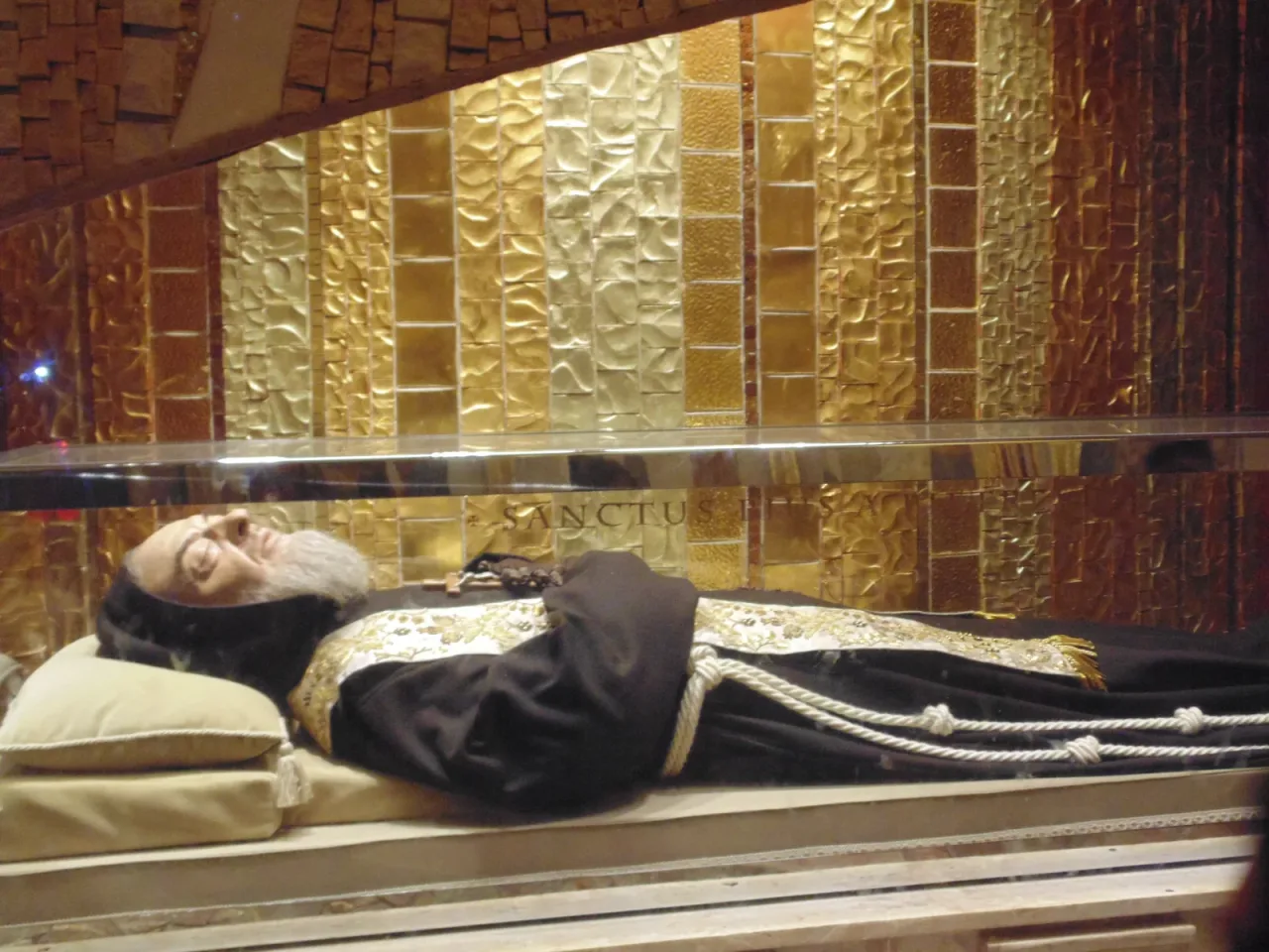The glass shrine containing Saint Pio's body in the pilgrimage church at San Giovanni Rotondo.