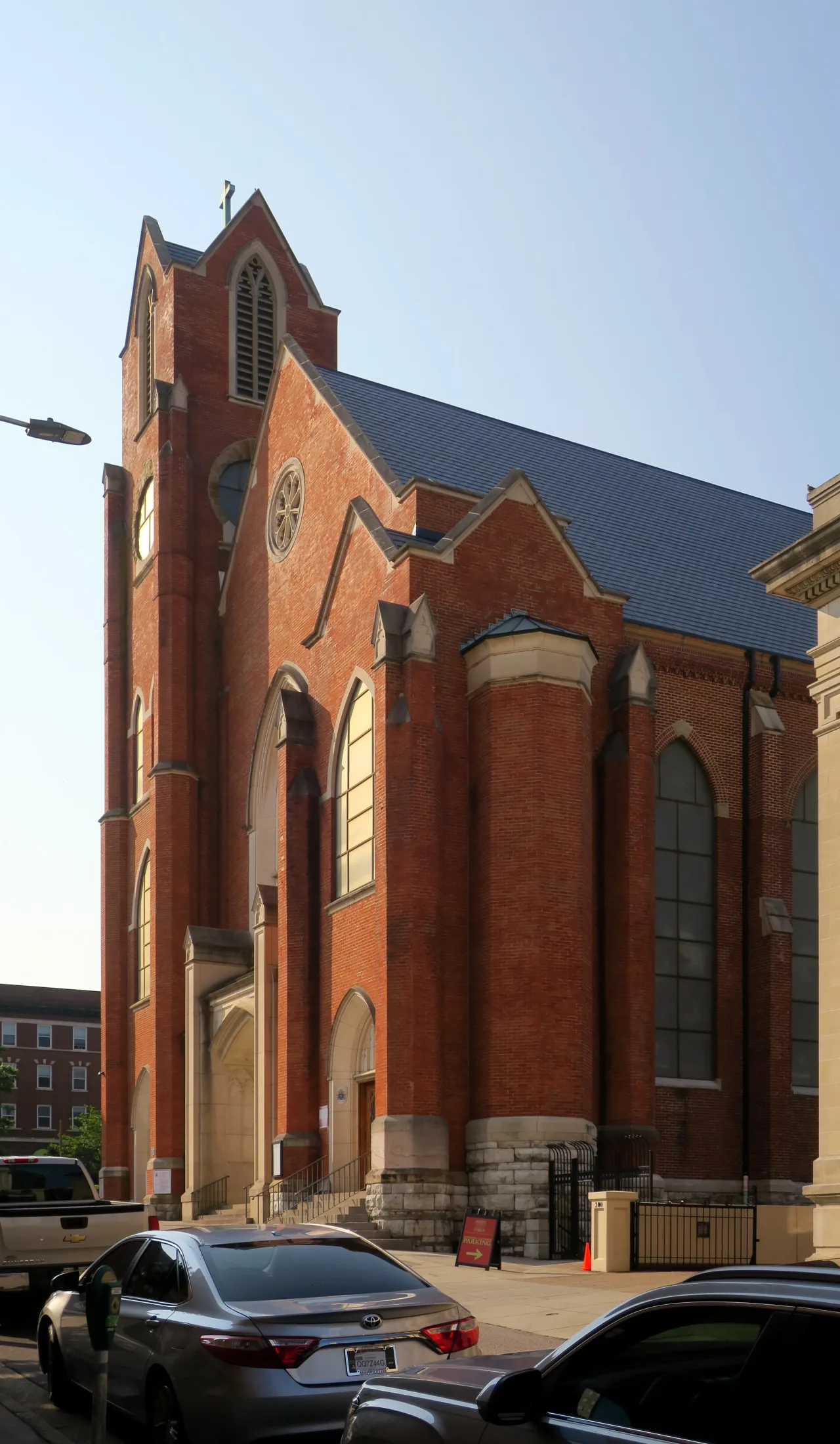 The stone facade and bell tower of the Basilica of Saints Peter and Paul in downtown Chattanooga.