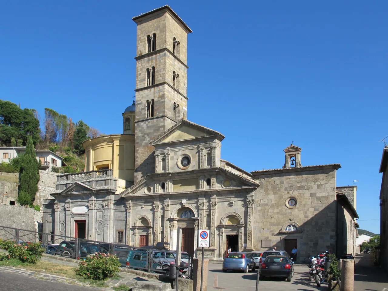 Santa Cristina in Bolsena, with the basilica facade and adjoining chapel exterior.