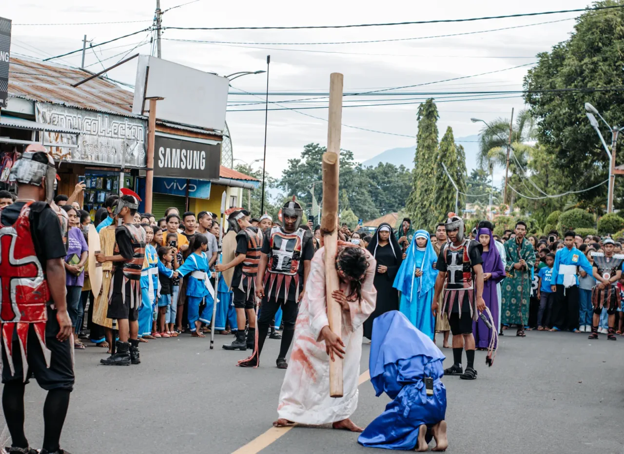 Young Catholics of Larantuka reenact the Passion in the streets during Holy Week.