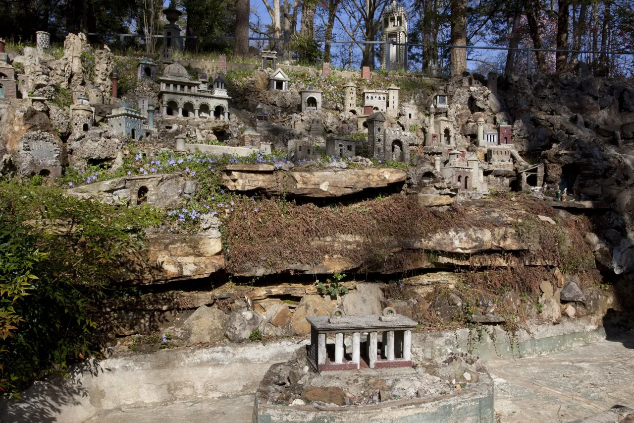Brother Joseph Zoettl's miniature sacred structures climbing the hillside at Ave Maria Grotto on the grounds of Saint Bernard Abbey.