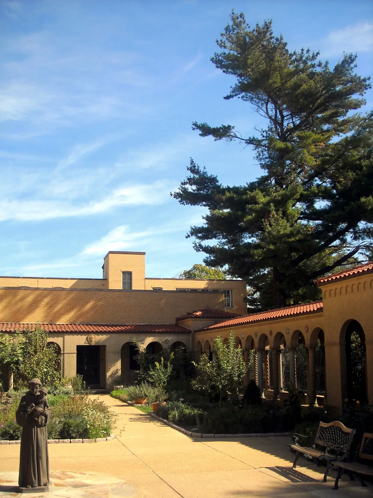 The Byzantine Revival church and monastery rising above the landscaped grounds of the Franciscan Monastery in Washington.