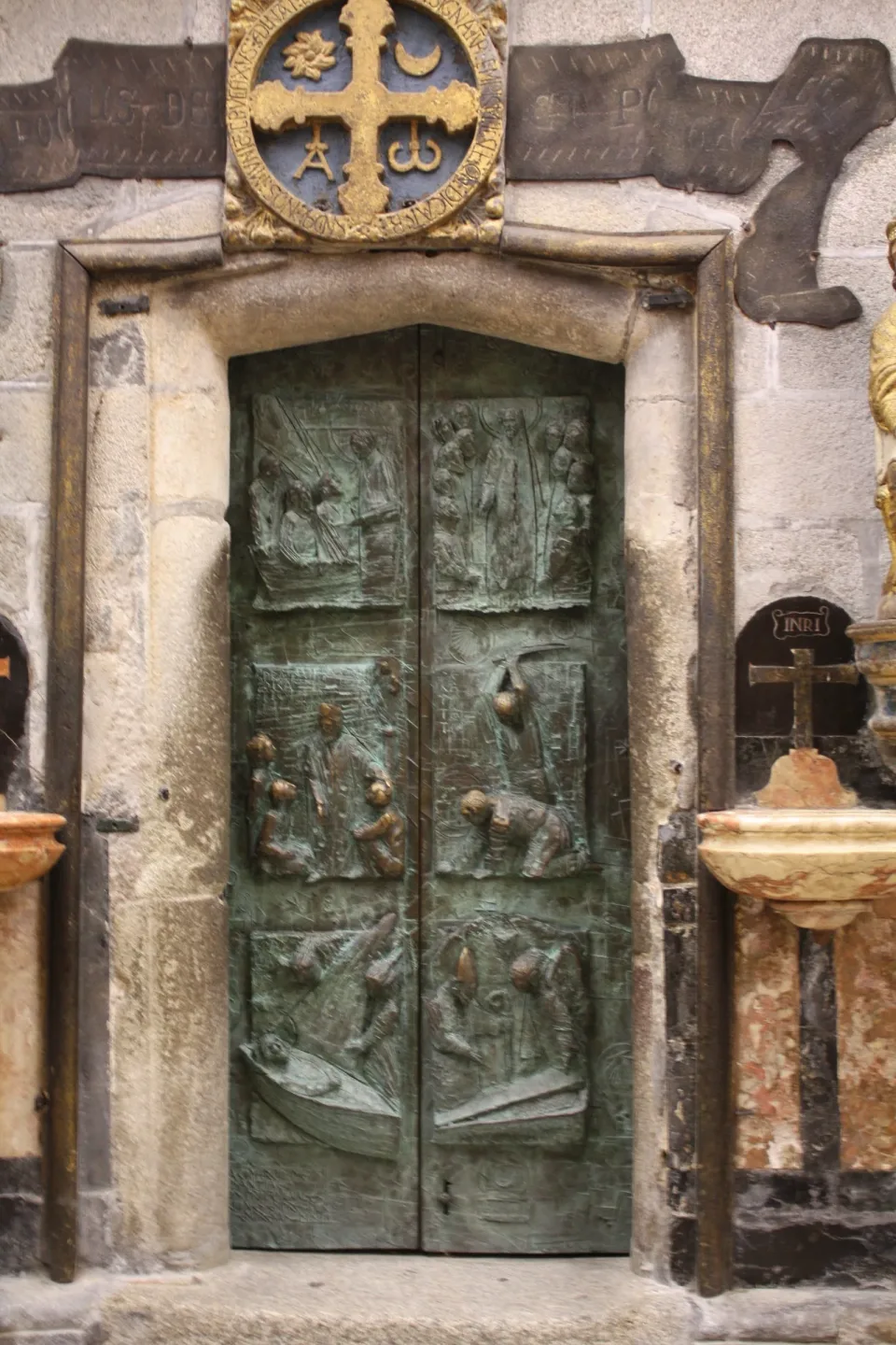 The Holy Door in the east wall of the cathedral of Santiago de Compostela.