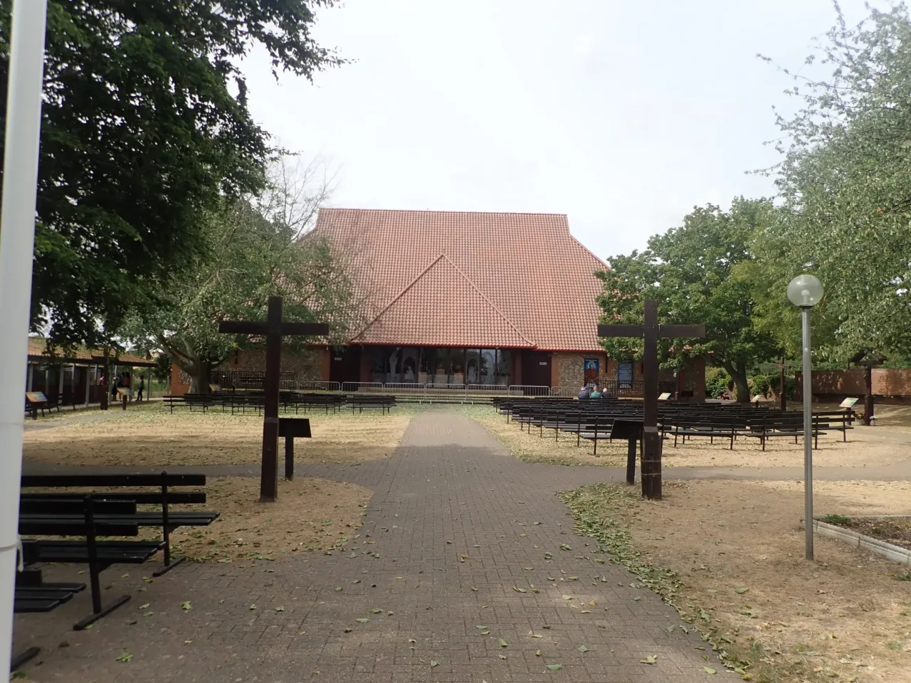 The Chapel of Our Lady of Reconciliation and outdoor seating in the Catholic National Shrine precinct at Houghton St Giles.