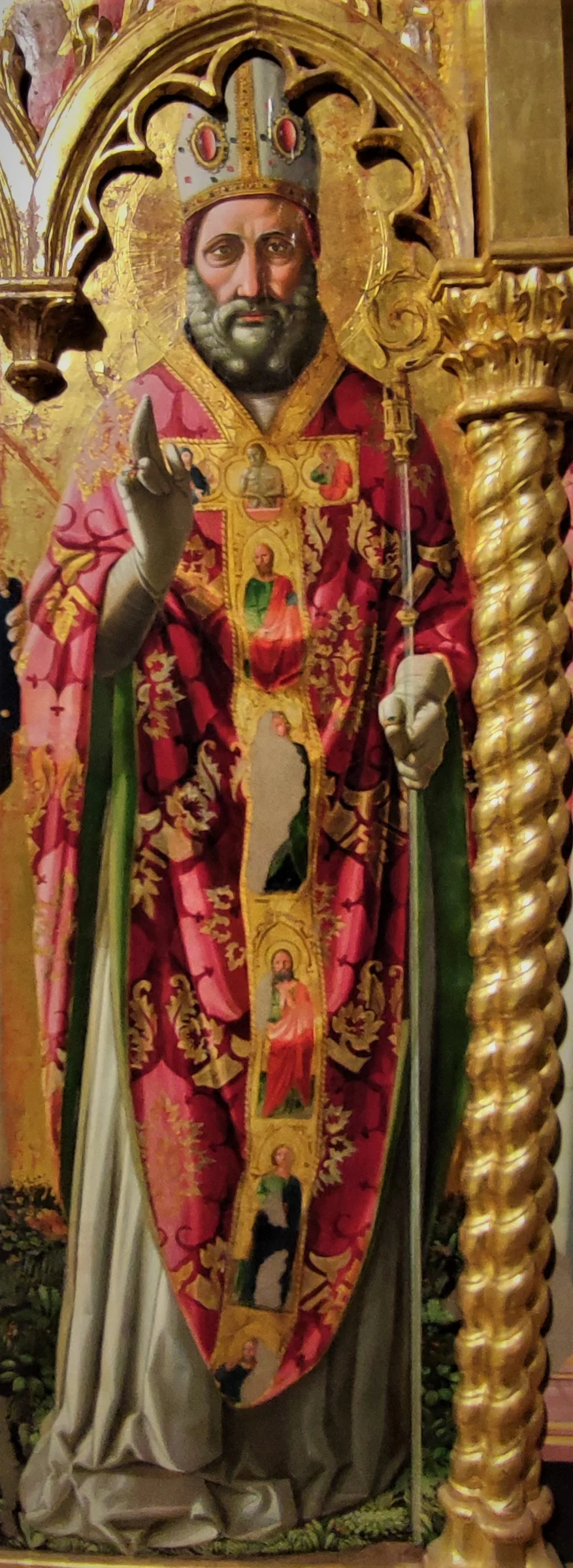Detail of a fifteenth-century painting depicting Saint Rufinus as a bishop and martyr.